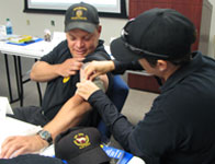 Police practicing bandaging