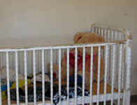 crib with toys
